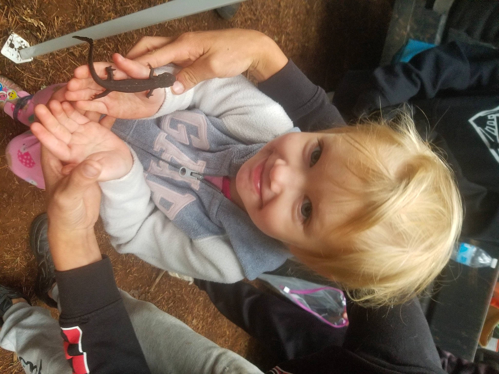 Justice joined the competition — help win amazing prizes! baby, child, comfort, eyelash, finger, fun, gesture, hand, joy, mobile_phone, mouth, nail, person, sitting, thumb, toddler, vacation, wrist