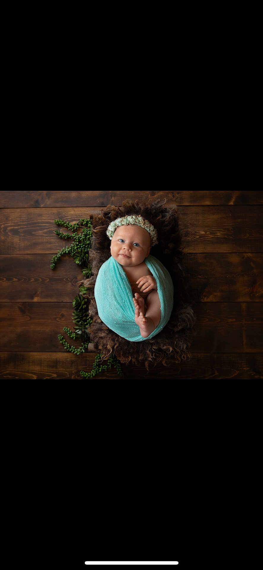 Ava-May is registered to the contest to win money with this photo: baby, bodypart, bonnet, cap, clothing, face, finger, hand, happy, hardwood, hat, head, leaf, newborn, person, photography, portrait, sitting, smile, wood