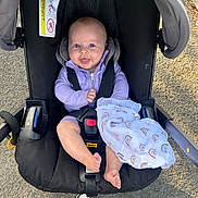 Ava-May is registered to the contest to win money with this photo: accessories, alloywheel, baby, car, carwheel, clothing, coat, face, footwear, head, jacket, pants, person, photography, portrait, shoe, stroller, sunglasses, transportation, vehicle