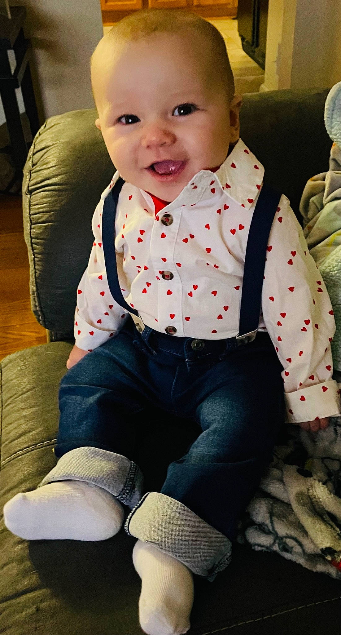Nicholas is registered to the contest to win money with this photo: baby, baby_toddler_clothing, black, cheek, child, collar, comfort, cool, dress_shirt, eye, face, happy, knee, pattern, person, skin, sleeve, smile, standing, toddler