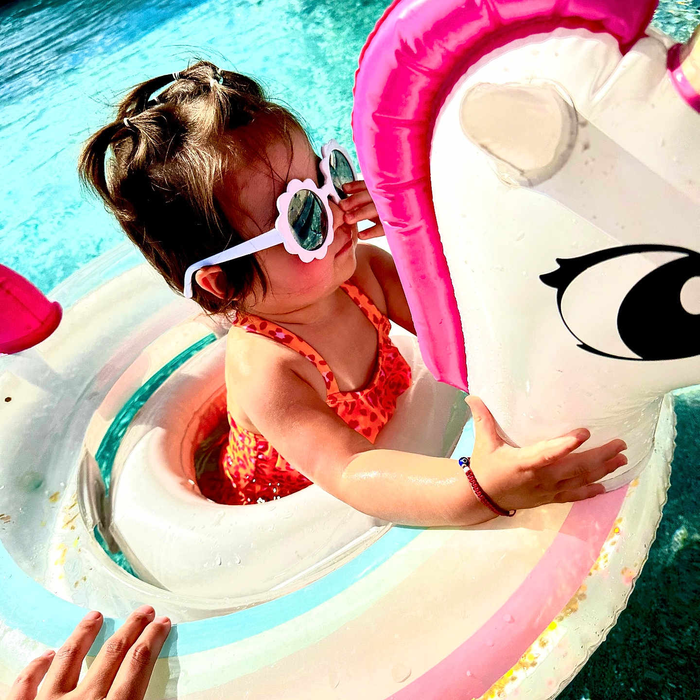 Mika is registered to the contest to win money with this photo: accessories, child, clothing, face, female, girl, head, leisureactivities, person, photography, pool, portrait, sport, summer, sunglasses, swimming, swimmingpool, swimwear, water, watersports