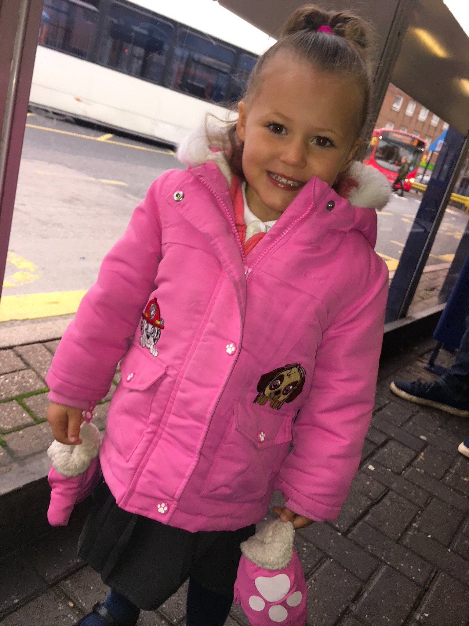 Cienna is registered to the contest to win money with this photo: child, coat, jacket, joy, magenta, outerwear, person, pink, plant, purple, smile, vacation, winter