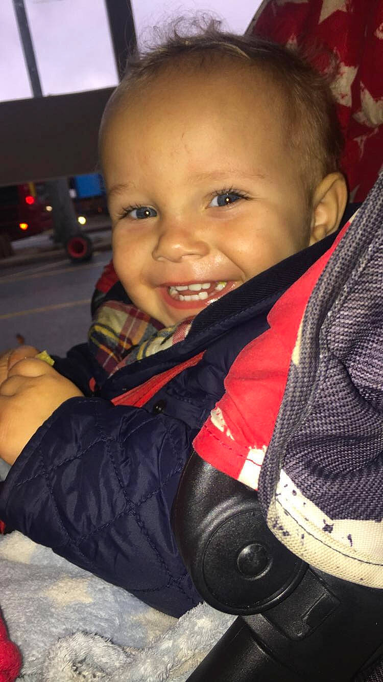 Isaac is registered to the contest to win money with this photo: boy, car_seat, cheek, child, cool, day, eye, fun, girl, infant, joy, person, product, sitting, skin, smile, toddler