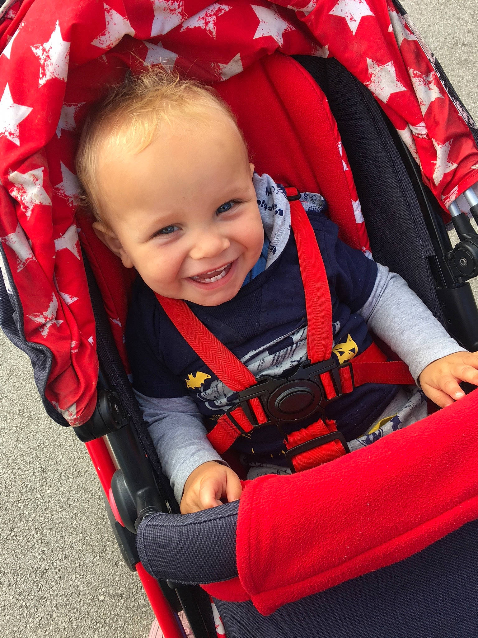 Isaac joined the competition — help win amazing prizes! baby_carriage, baby_products, car_seat, child, day, fun, joy, lifejacket, person, personal_flotation_device, personal_protective_equipment, product, red, smile, toddler