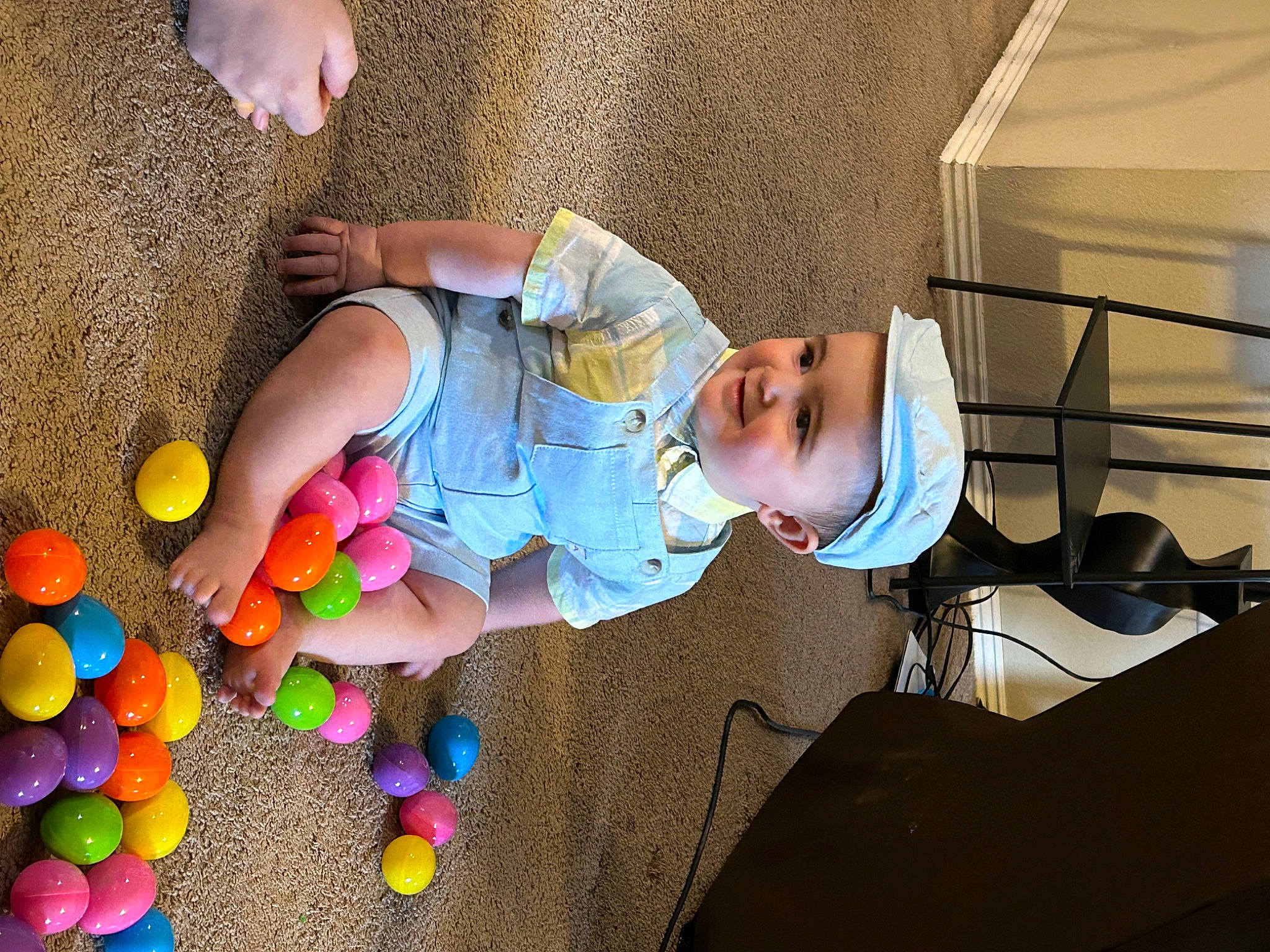 Chrystian joined the competition — help win amazing prizes! baby, baby_products, baby_toddler_clothing, baby_toys, child, finger, foot, fun, hat, headwear, human_leg, joy, leisure, person, plastic, play, room, sitting, t_shirt, toddler