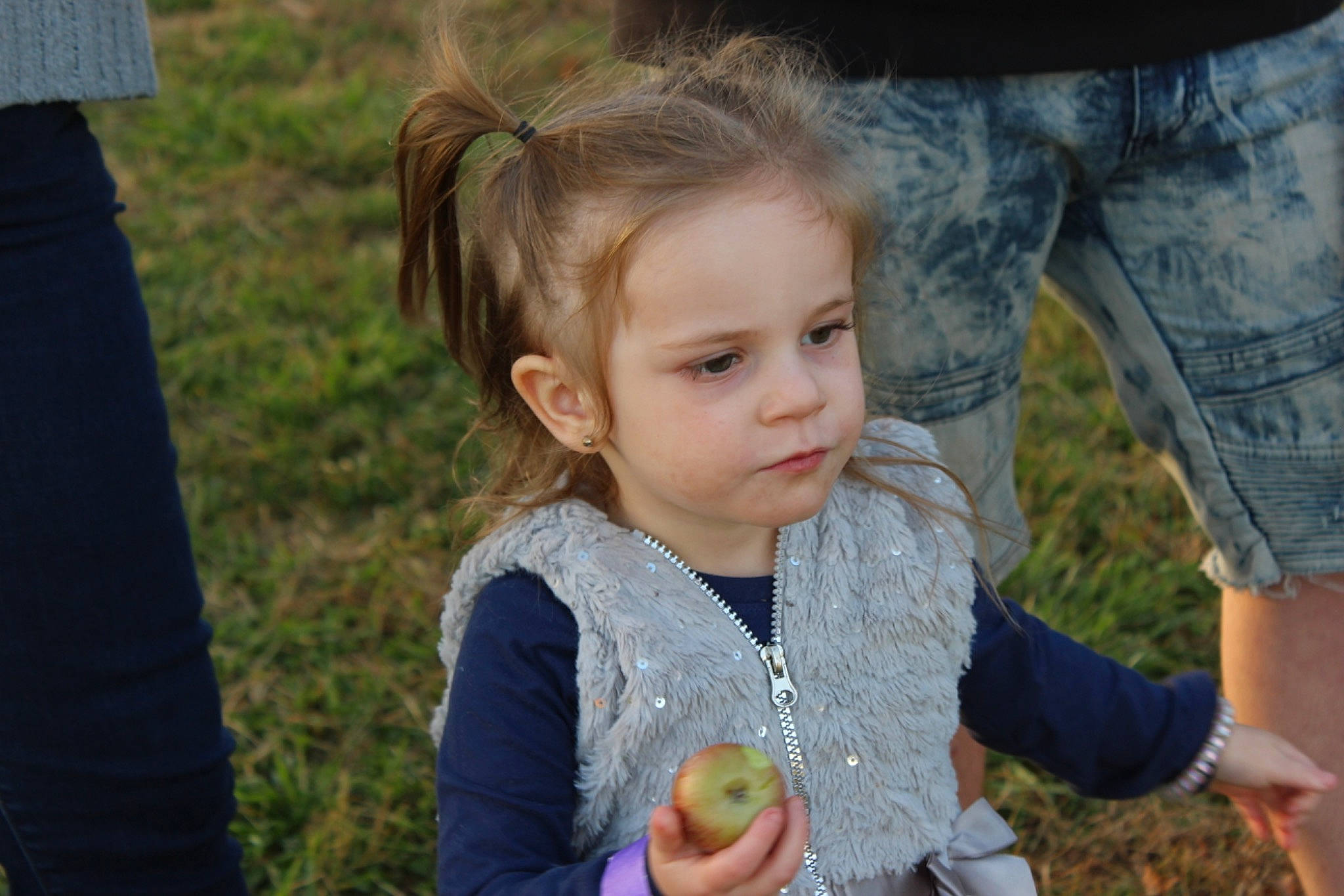Blakeleigh is registered to the contest to win money with this photo: baby_toddler_clothing, child, event, facial_expression, food, fruit, fun, gesture, grass, grass_family, happy, iris, leaf, natural_foods, people, people_in_nature, person, photograph, plant, summer