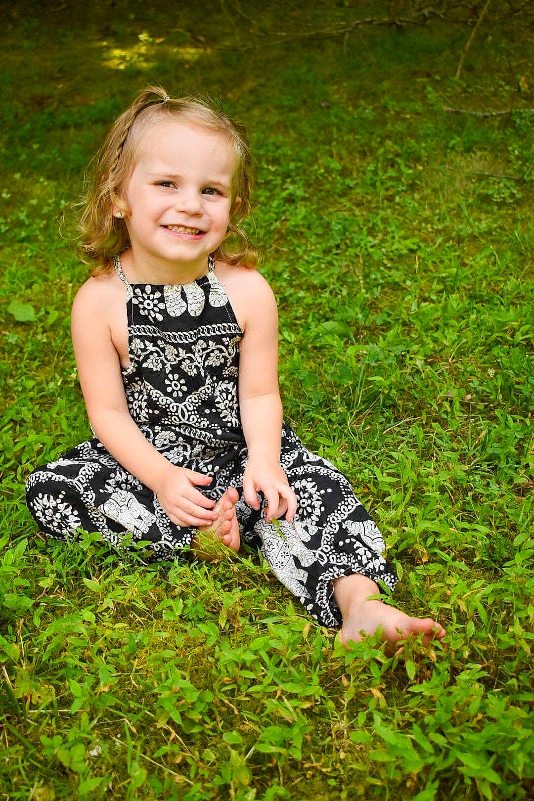Blakeleigh joined the competition — help win amazing prizes! baby_toddler_clothing, child, day_dress, dress, flash_photography, fun, grass, grassland, groundcover, happy, joy, leisure, meadow, one_piece_garment, pattern, people_in_nature, person, plant, sitting, sleeve