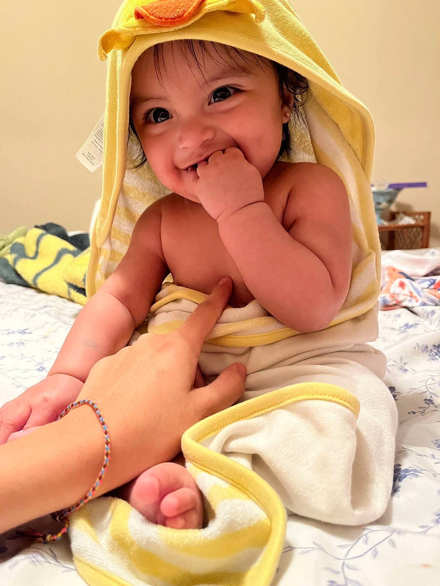 Leilani is registered to the contest to win money with this photo: baby, baby_toddler_clothing, cap, child, comfort, eye, finger, foot, happy, headwear, human_leg, joy, knee, mouth, nail, person, skin, smile, stomach, thigh