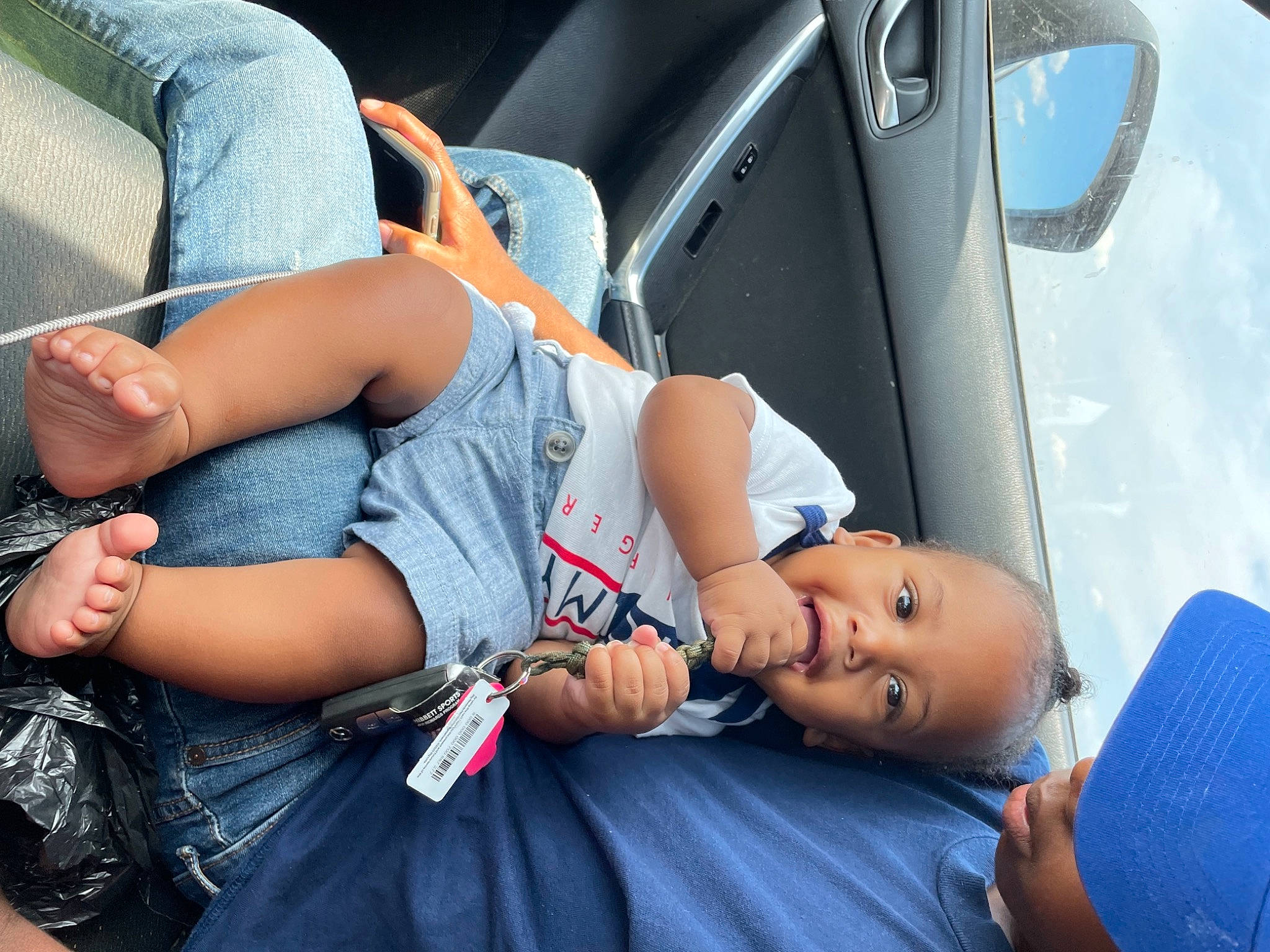 Chase is registered to the contest to win money with this photo: automotive_design, automotive_exterior, automotive_lighting, black_hair, comfort, elbow, electric_blue, fun, human_body, human_leg, joint, knee, leg, motor_vehicle, mouth, muscle, person, product, shoulder, thigh