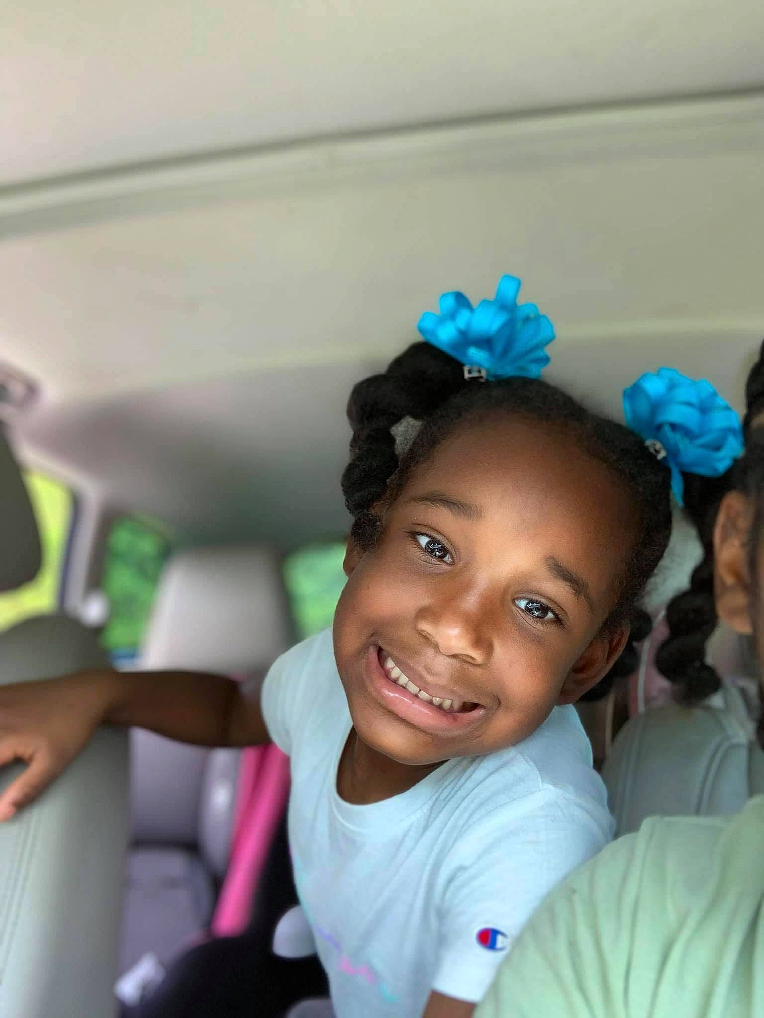 Aubrey is registered to the contest to win money with this photo: black_hair, child, cool, ear, event, eyebrow, fashion_accessory, fun, hairstyle, happy, headband, headgear, headpiece, jewellery, joy, leisure, party_supply, person, room, smile