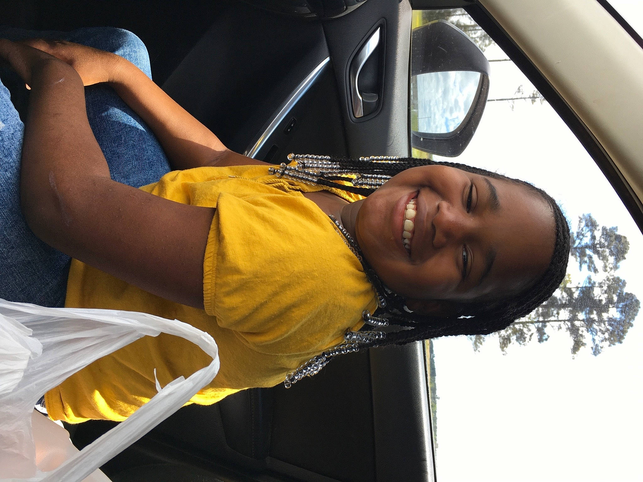 Kaylee is registered to the contest to win money with this photo: audio_equipment, auto_part, automotive_design, automotive_exterior, automotive_lighting, automotive_mirror, cool, elbow, eyewear, family_car, flash_photography, fun, happy, joy, leisure, motor_vehicle, person, personal_luxury_car, rear_view_mirror, smile