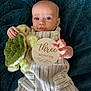 Onnie-Clay joined the competition — help win amazing prizes! baby, blanket, blue_eyes, child, cozy, cute, face, hand, home, infant, lying_down, newborn, plush_toy, portrait, smile, soft_texture, striped_outfit, three_months, turtle, wooden_sign