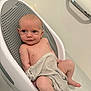 Onnie-Clay is registered to the contest to win money with this photo: baby, bathtub, bath_time, towel, infant, baby_seat, water, bathroom, skin, cute, smile, child, relaxing, sitting, barefoot, head, face, young_child, domestic, indoor