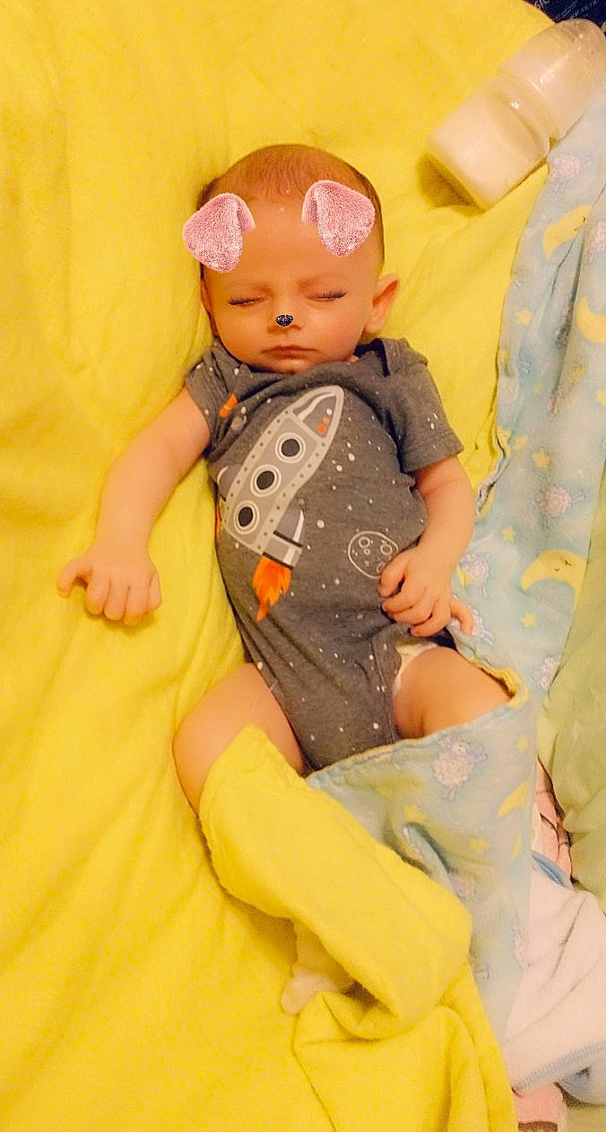 Christopher is registered to the contest to win money with this photo: baby, child, person, toddler, yellow