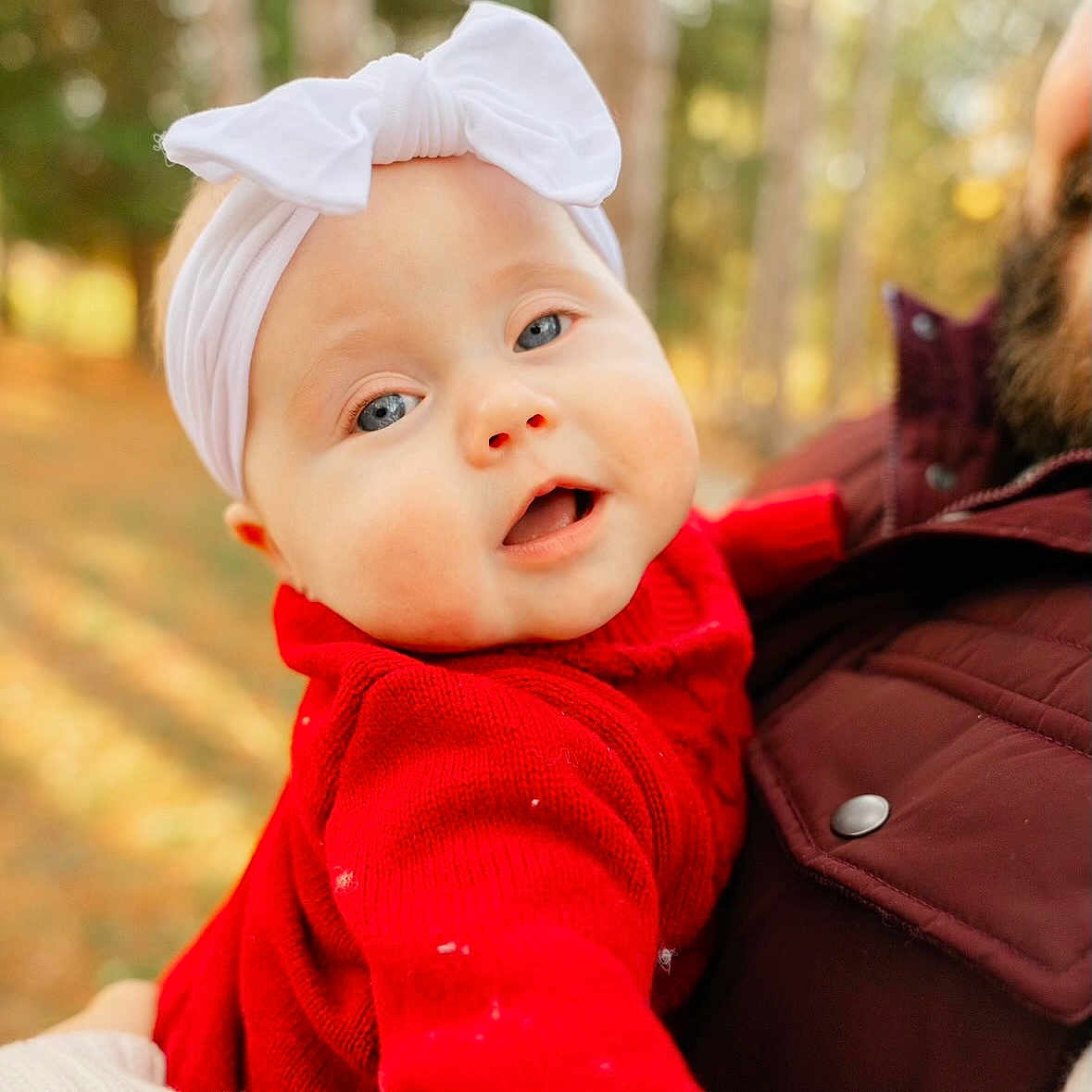 Zoey is registered to the contest to win money with this photo: accessories, baby, babylaughing, baseballcap, beanie, beard, blazer, blonde, bodypart, bonnet, cap, clothing, coat, costume, earring, face, finger, fleece, frown, glove