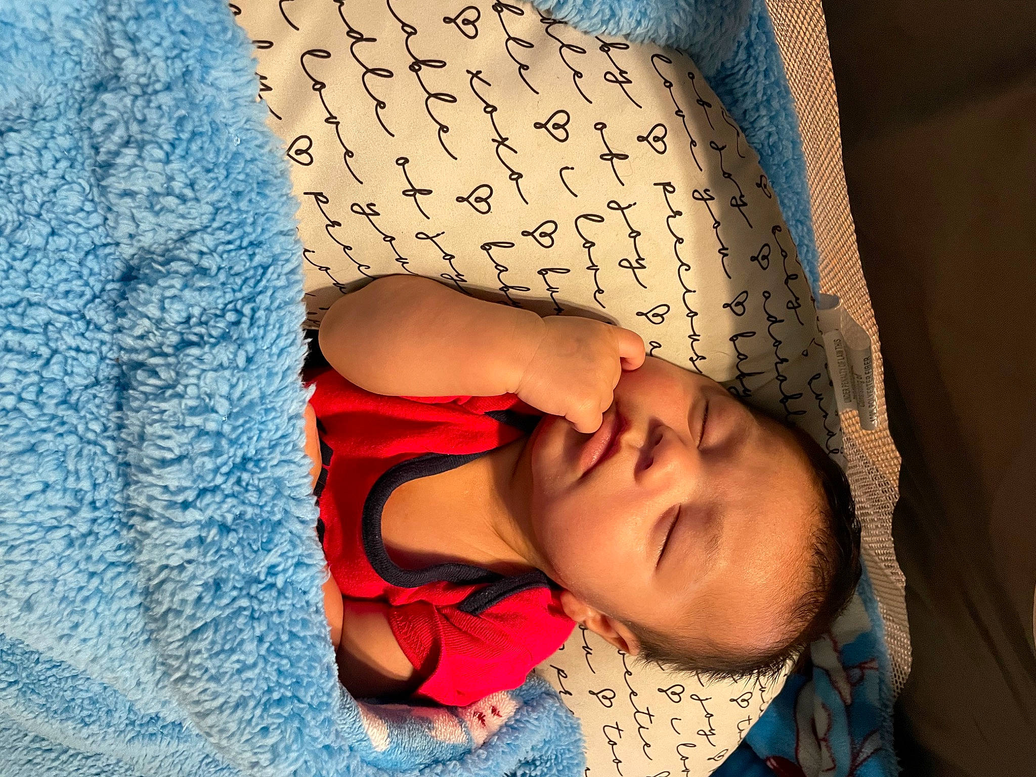 Georgie joined the competition — help win amazing prizes! baby, bedding, blue, chest, child, comfort, elbow, electric_blue, eyelash, finger, fun, happy, human_leg, linens, neck, pattern, person, room, sleeve, textile