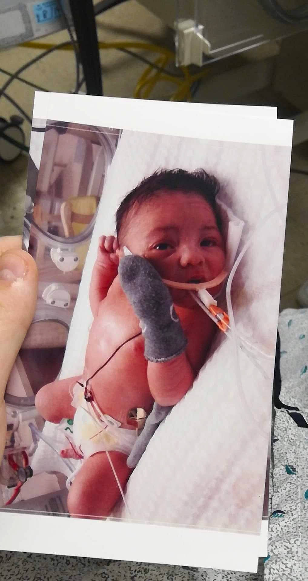 Zayvion is registered to the contest to win money with this photo: baby, birth, child, childbirth, flesh, mouth, nose, person, photography, selfie