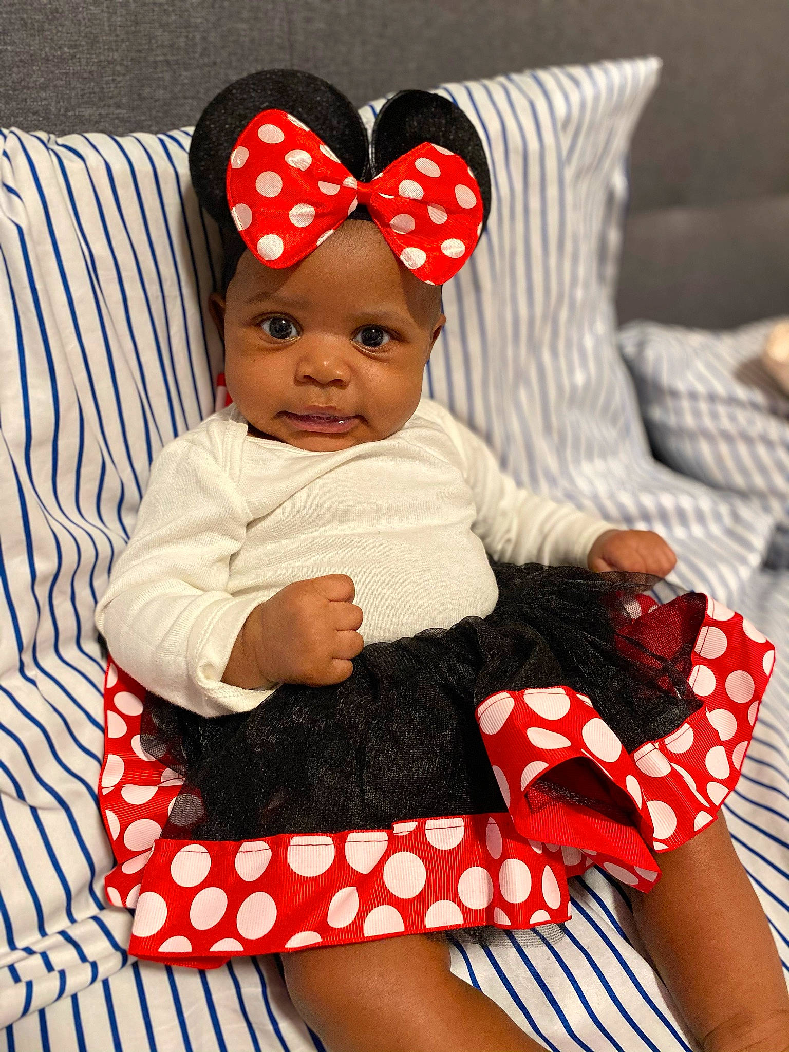 Carrington joined the competition — help win amazing prizes! baby, baby_products, baby_toddler_clothing, child, design, ear, headgear, headwear, linens, pattern, person, polka_dot, product, red, textile, toddler