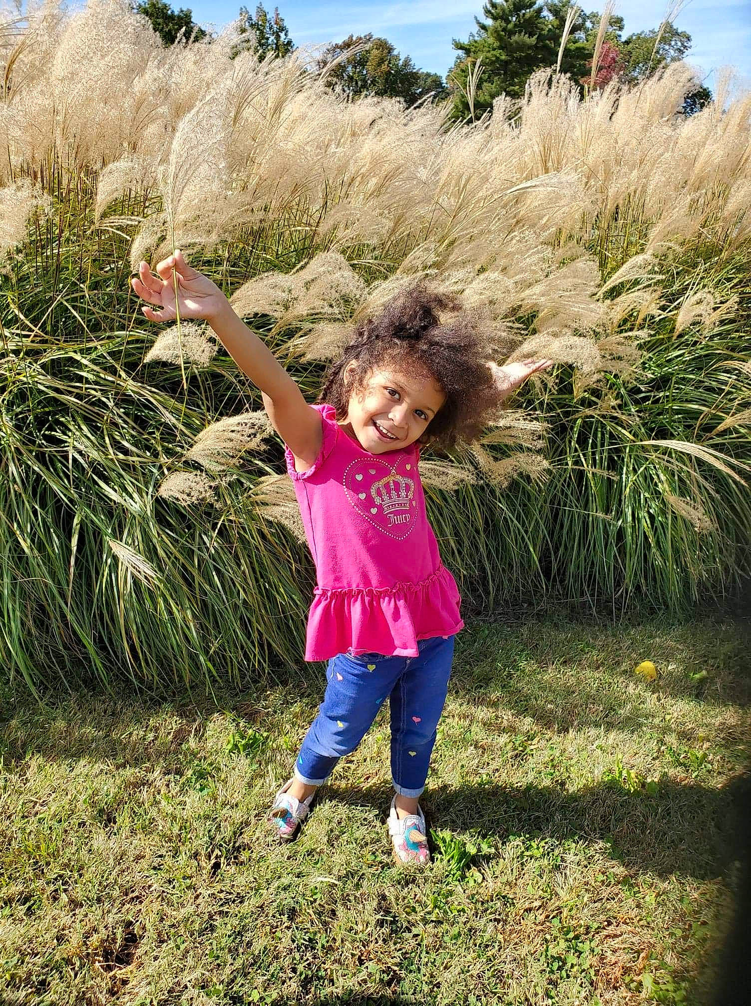 Ka'Lea is registered to the contest to win money with this photo: child, fun, grass, grass_family, grassland, happy, joy, meadow, people_in_nature, person, photography, plant, play, spring, toddler, tree, vacation