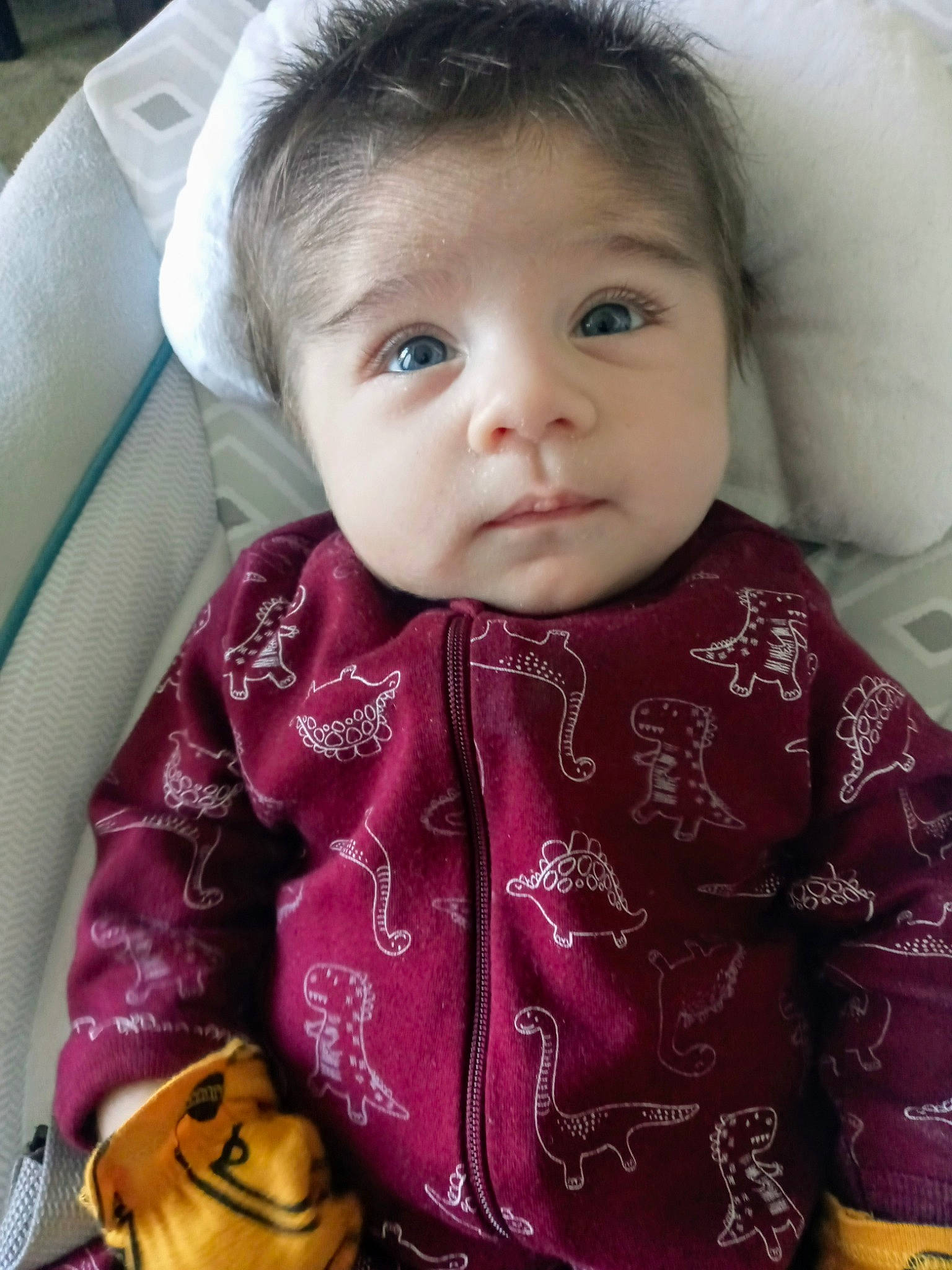 Damien is registered to the contest to win money with this photo: baby, beauty, brown_hair, cheek, child, chin, eye, eyebrow, face, forehead, head, iris, lip, mouth, nose, outerwear, person, pink, skin, smile