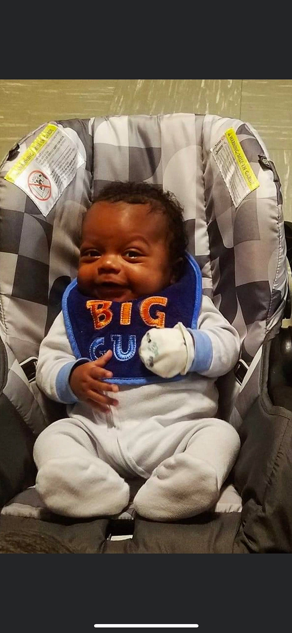 Kaiveon is registered to the contest to win money with this photo: baby, baby_carriage, baby_in_car_seat, baby_products, baby_safety, baby_toddler_clothing, car_seat, child, comfort, event, face, fun, gesture, lap, linens, person, sitting, toddler
