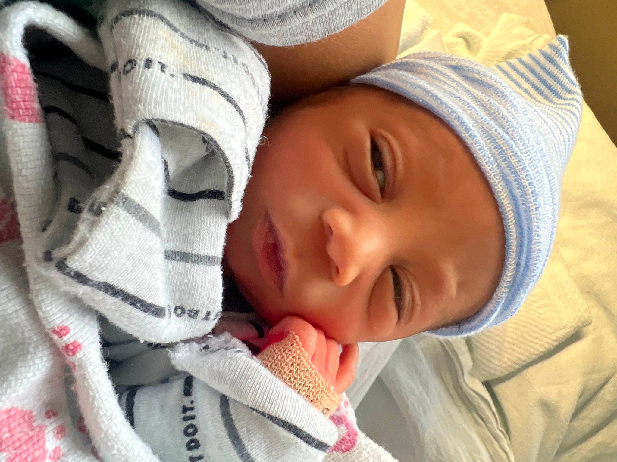 Kamari joined the competition — help win amazing prizes! baby, baby_products, baby_toddler_clothing, cheek, child, close_up, comfort, face, happy, hat, headwear, linens, lip, mouth, nose, person, product, skin, smile, textile