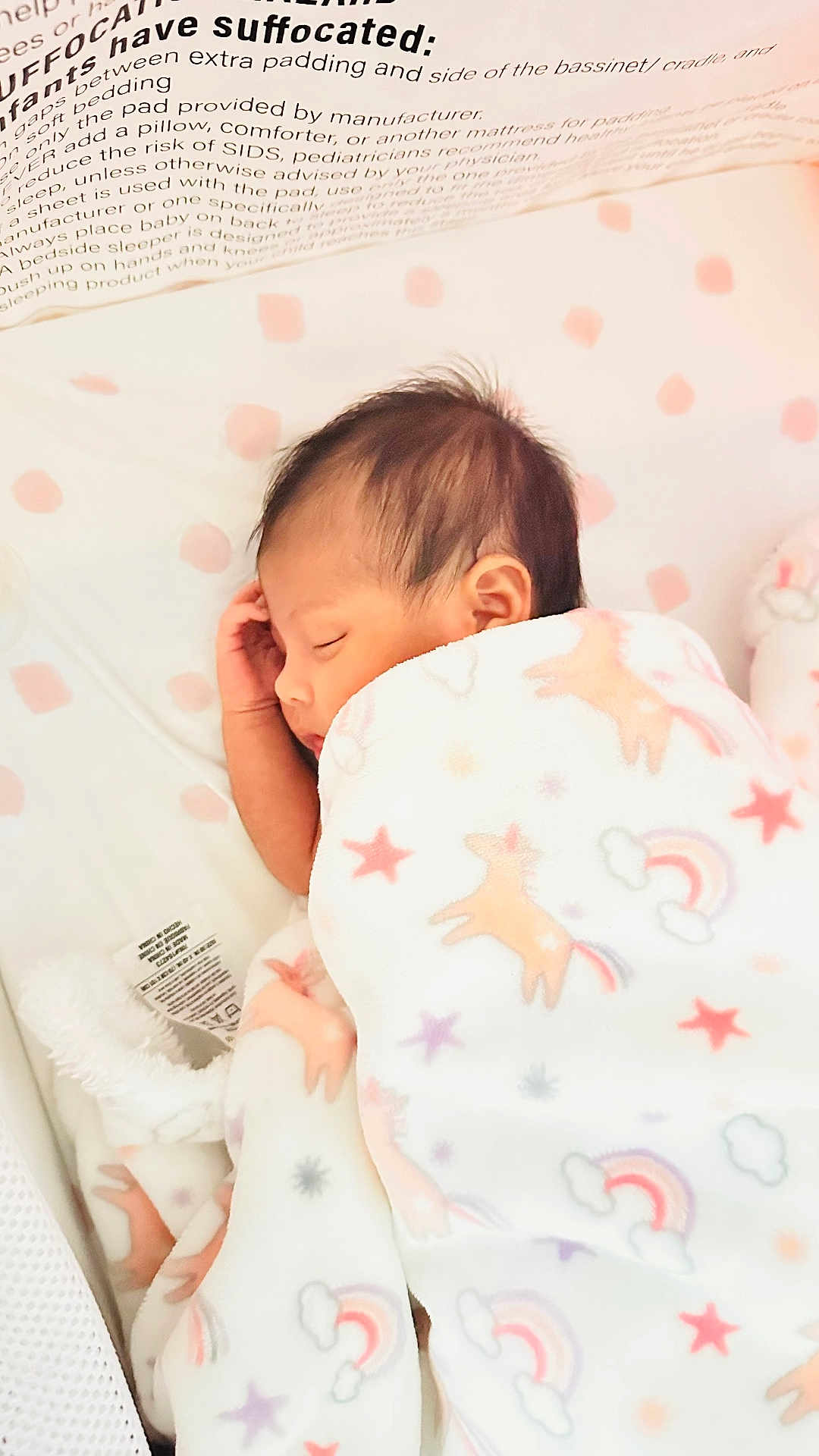 Makeda is registered to the contest to win money with this photo: baby, sleeping, blanket, unicorn, stars, rainbow, bassinet, infant, soft, cozy, cute, child, peaceful, resting, pajamas, newborn, comfort, face, hand, hair