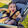 baby, city, clothing, face, furniture, grass, head, machine, nature, outdoors, pants, park, person, photography, plant, portrait, road, street, stroller, urban
