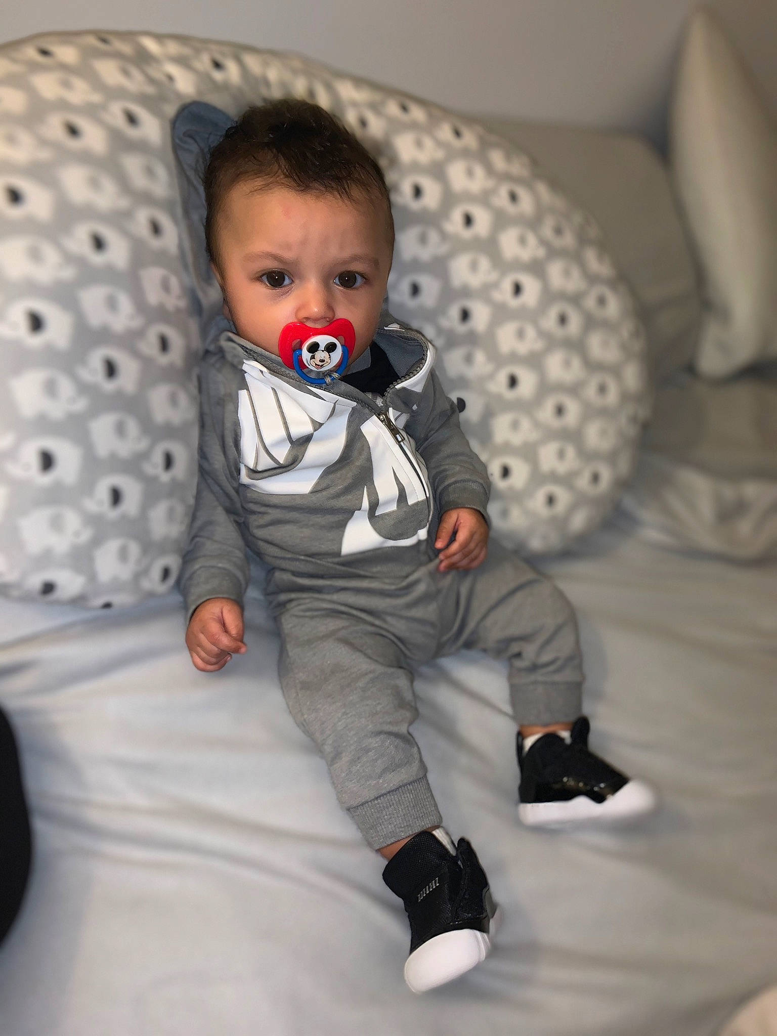 Messiah is registered to the contest to win money with this photo: baby, child, fun, person, sitting, skin, smile, toddler