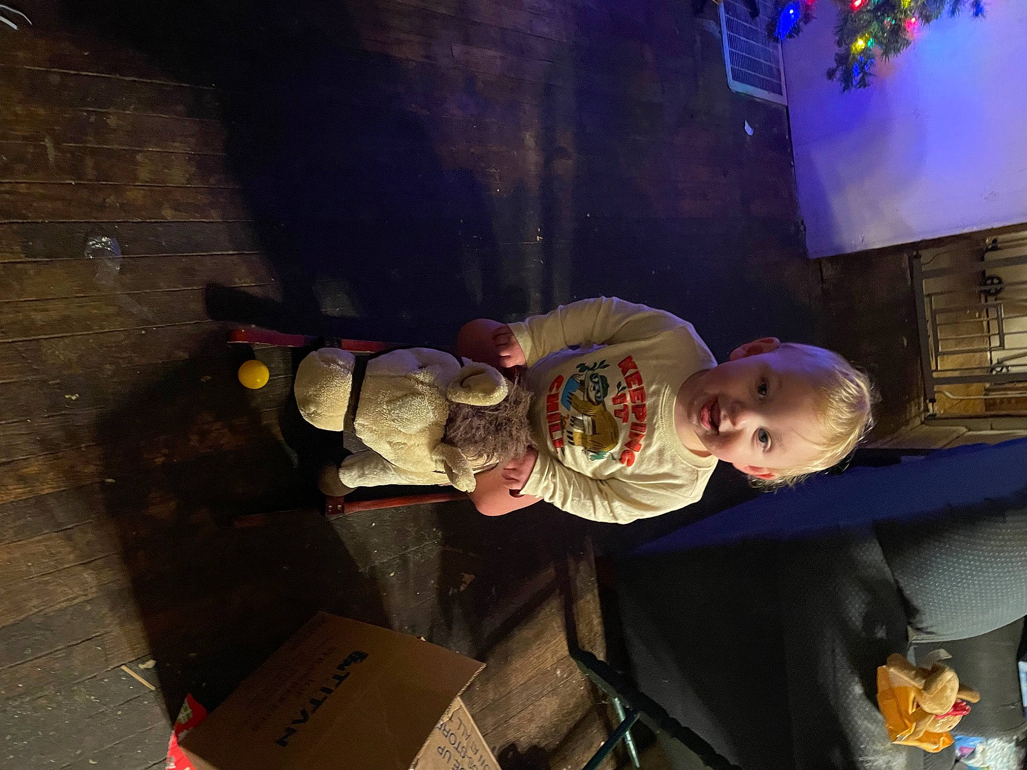 Malakai is registered to the contest to win money with this photo: automotive_lighting, baby, child, event, fun, person, personal_protective_equipment, room, space, toddler, world