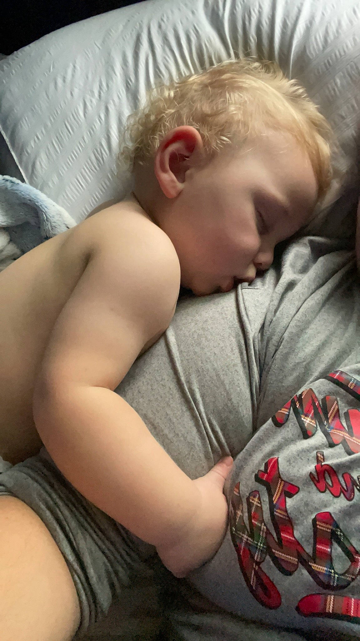 Malakai is registered to the contest to win money with this photo: baby, baby_sleeping, bedtime, carmine, cheek, chest, child, comfort, grass, happy, linens, muscle, organ, pattern, person, plaid, sitting, skin, textile, toddler