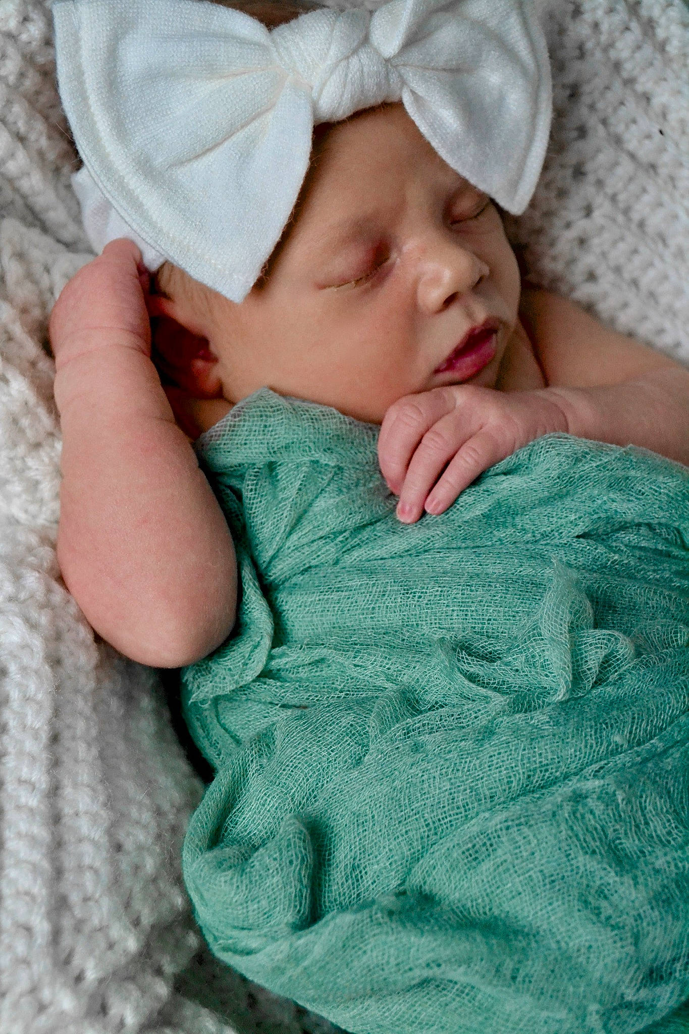 Emerie joined the competition — help win amazing prizes! baby, baby_sleeping, baby_toddler_clothing, cap, cheek, child, comfort, face, green, grey, headwear, knit_cap, linens, pattern, person, pink, skin, sleeve, textile, toddler