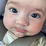 baby, close_up, face, car_seat, child, infant, straps, safety, cute, tongue, eyes, expression, clothing, seatbelt, portrait, young_child, adorable, skin, head, person