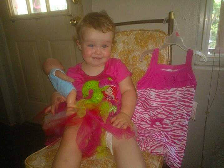 Desiree joined the competition — help win amazing prizes! baby, baby_toddler_clothing, child, curtain, embellishment, facial_expression, fun, happy, joy, magenta, pattern, person, pink, room, sitting, sleeve, smile, standing, textile, thumb