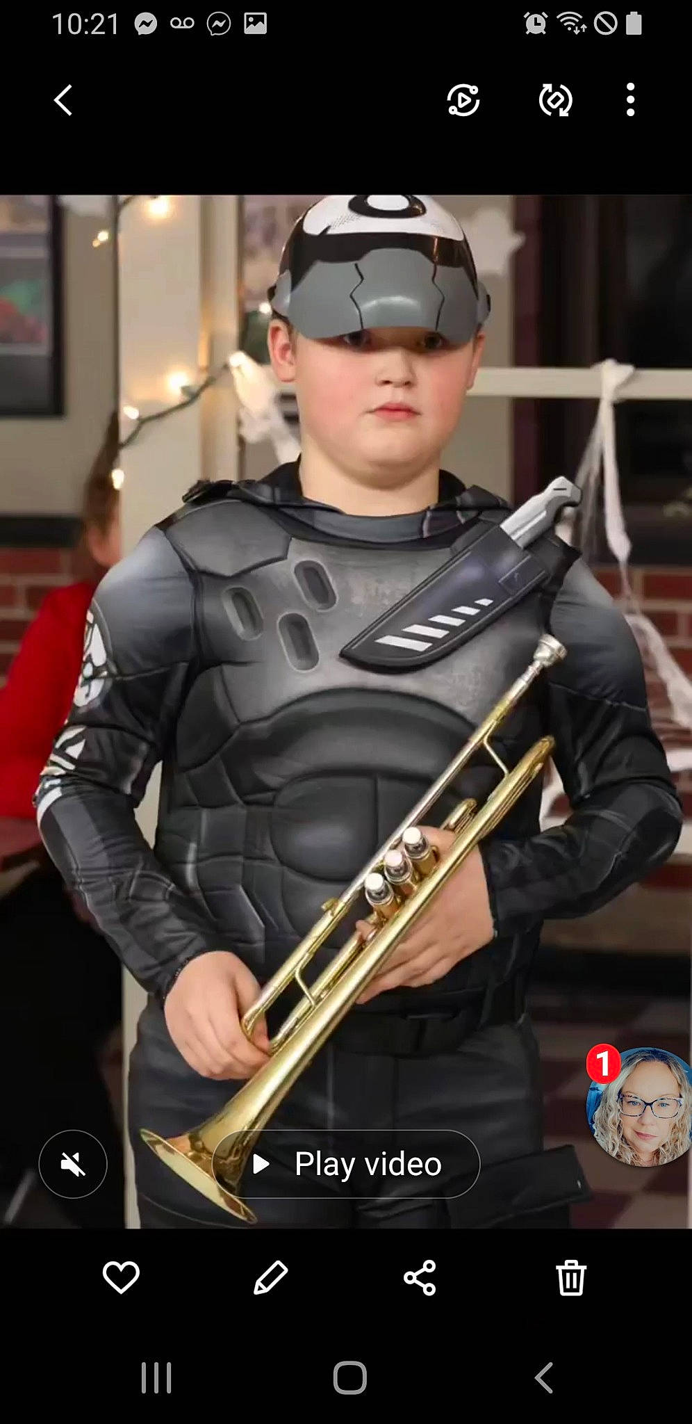 Redmond is registered to the contest to win money with this photo: action_figure, action_film, armour, belt, costume, entertainment, event, fiction, fictional_character, glove, headwear, hero, justice_league, music, musician, person, personal_protective_equipment, picture_frame, shield, shotgun