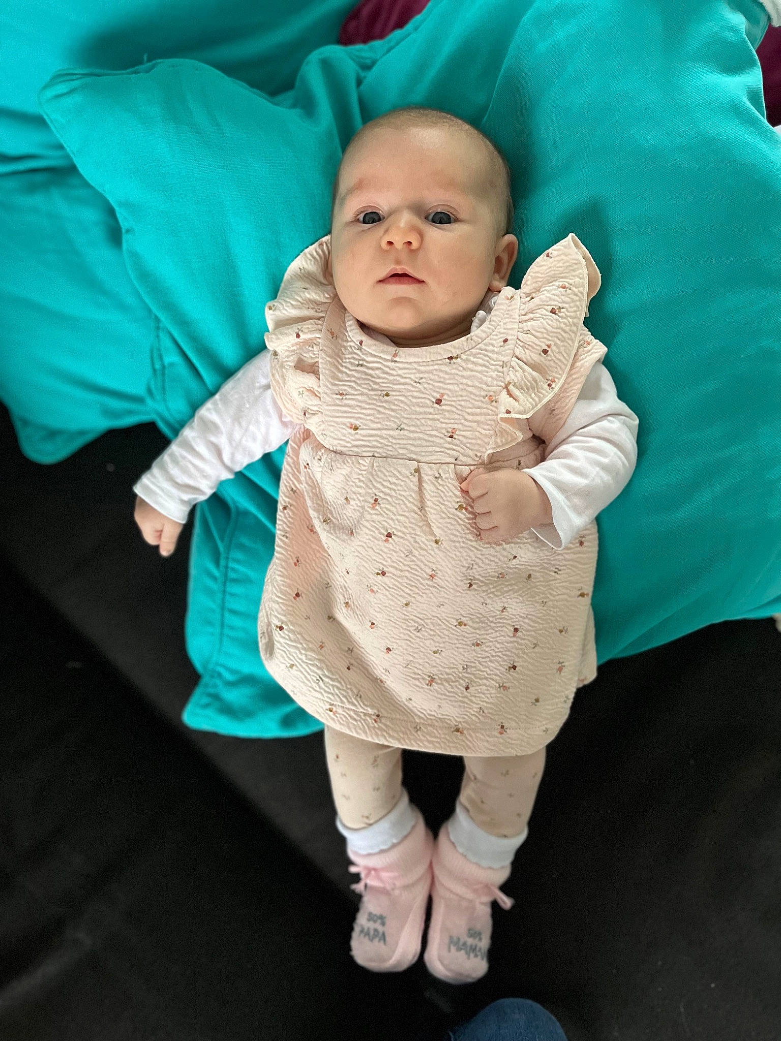 Keissy participe au concours pour gagner de l'argent avec cette photo : baby, baby_products, baby_toddler_clothing, child, dress, event, eye, face, fun, gesture, grass, green, happy, linens, pattern, person, portrait_photography, sitting, skin, sleeve