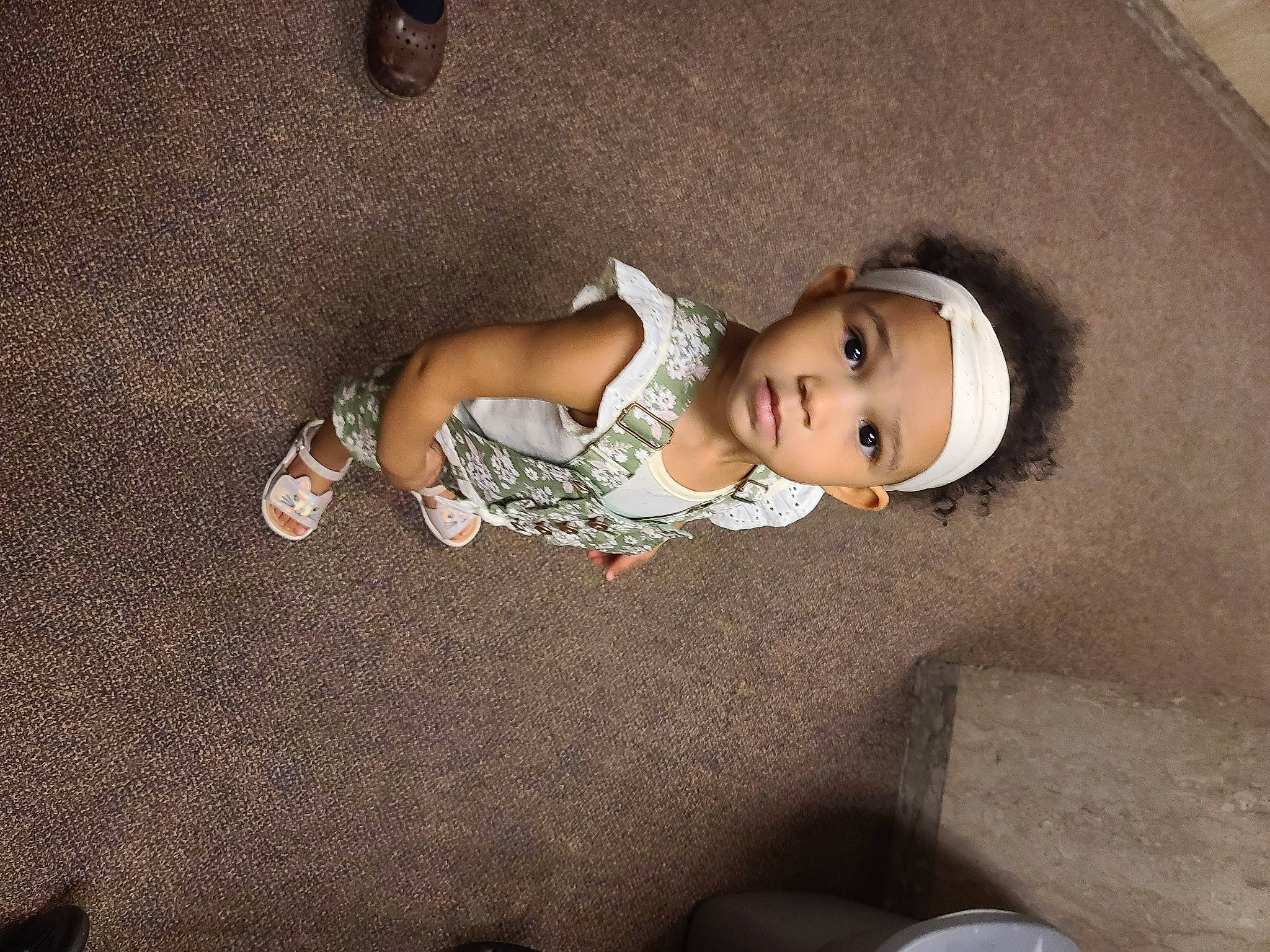 Syrenity is registered to the contest to win money with this photo: baby, baby_toddler_clothing, cheek, child, comfort, flash_photography, floor, flooring, fun, grass, headwear, human_leg, person, room, sitting, skin, toddler, tree, wood