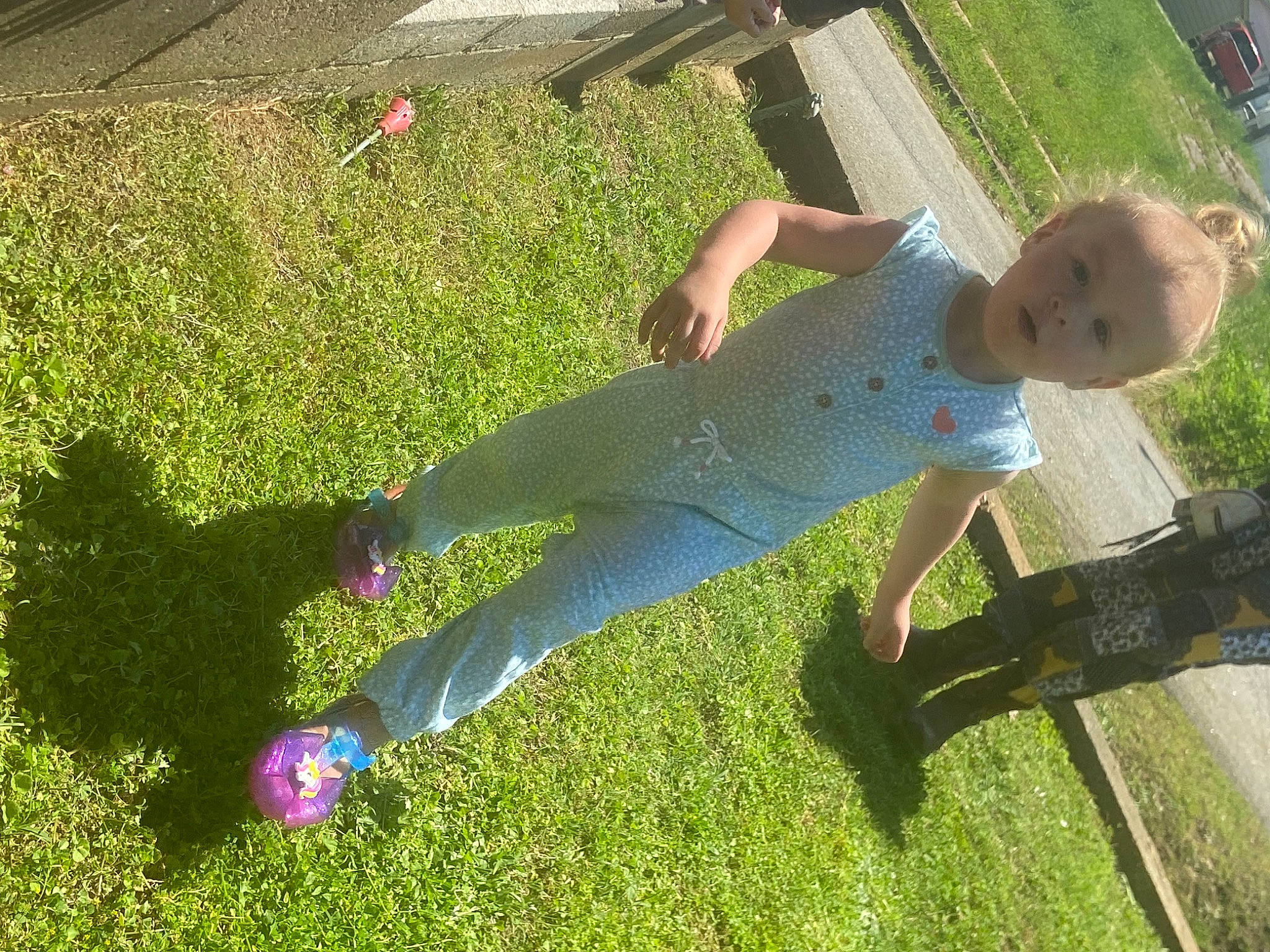 Macie is registered to the contest to win money with this photo: city, electric_blue, fun, grass, grass_family, grassland, happy, human_leg, knee, landscape, lawn, leisure, outdoor_furniture, people_in_nature, person, plant, recreation, shadow, sitting, thigh