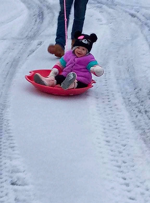 Macie joined the competition — help win amazing prizes! baby_toddler_clothing, event, freezing, fun, happy, hat, headwear, ice_cap, joy, leisure, magenta, person, recreation, sled, sledding, slope, snow, sports, toddler, travel