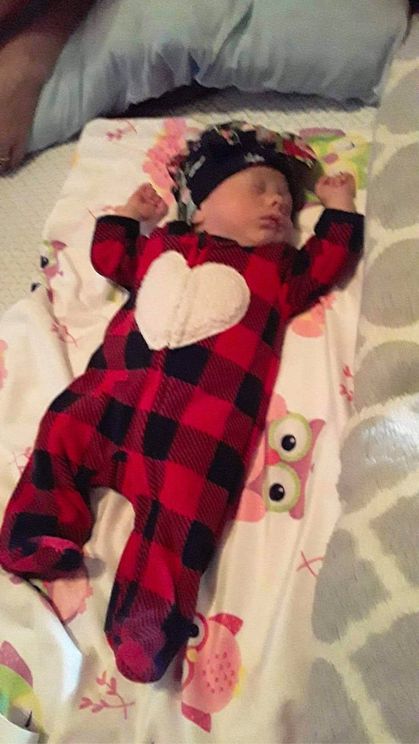 Macie joined the competition — help win amazing prizes! baby, baby_toddler_clothing, bed, bed_sheet, bedding, child, collar, comfort, fur, headwear, linens, pattern, person, pink, plaid, room, sleeve, stuffed_toy, tartan, thigh