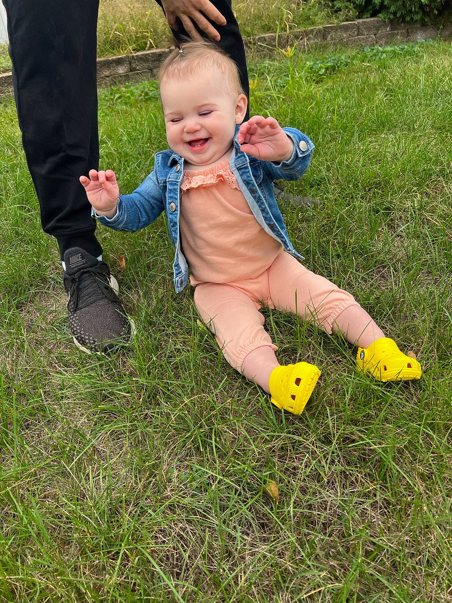 Mckenna is registered to the contest to win money with this photo: baby, baby_toddler_clothing, child, eye, fun, gesture, grass, grass_family, grassland, happy, joy, lawn, people_in_nature, person, plant, recreation, smile, spring, toddler, toy