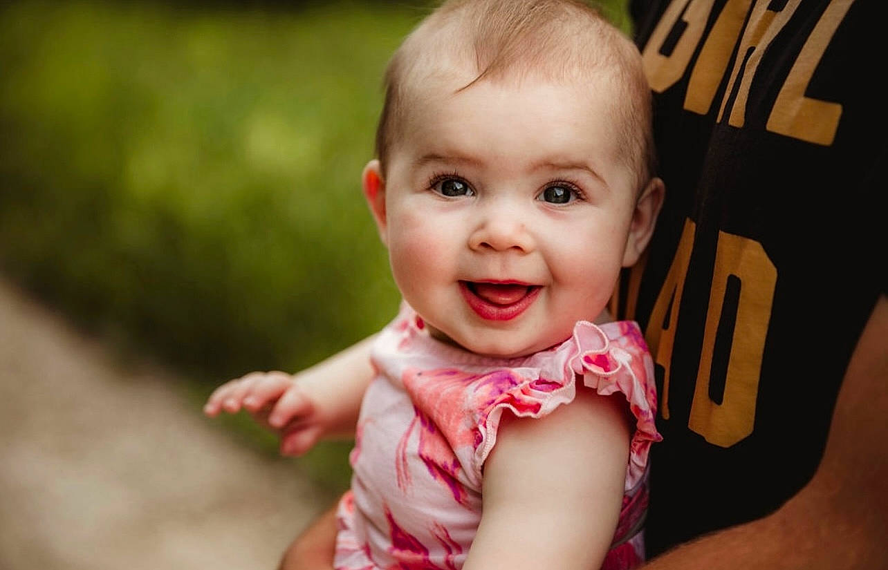 Mckenna joined the competition — help win amazing prizes! baby, baby_toddler_clothing, cheek, chin, dress, eye, flash_photography, fun, grass, happy, head, iris, joy, lip, nose, person, plant, skin, smile, t_shirt