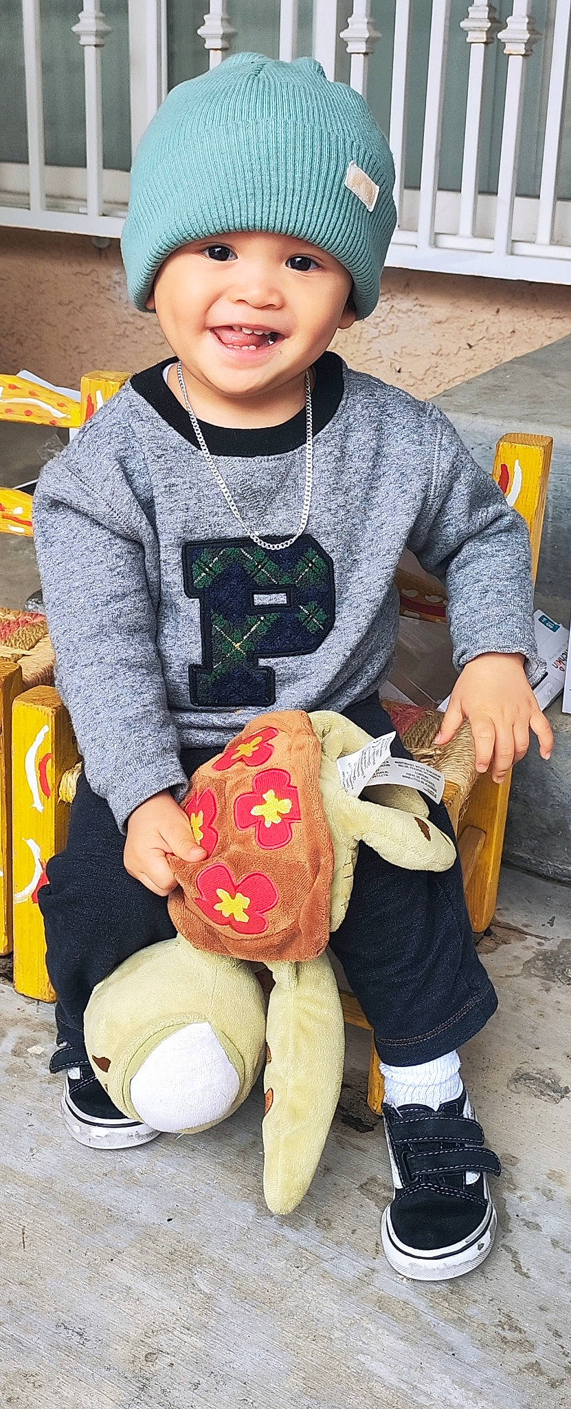 Paulix is registered to the contest to win money with this photo: baby_toddler_clothing, child, event, fun, happy, hat, headwear, people, person, photograph, play, product, sitting, sleeve, smile, snapshot, stuffed_toy, t_shirt, teddy_bear, textile