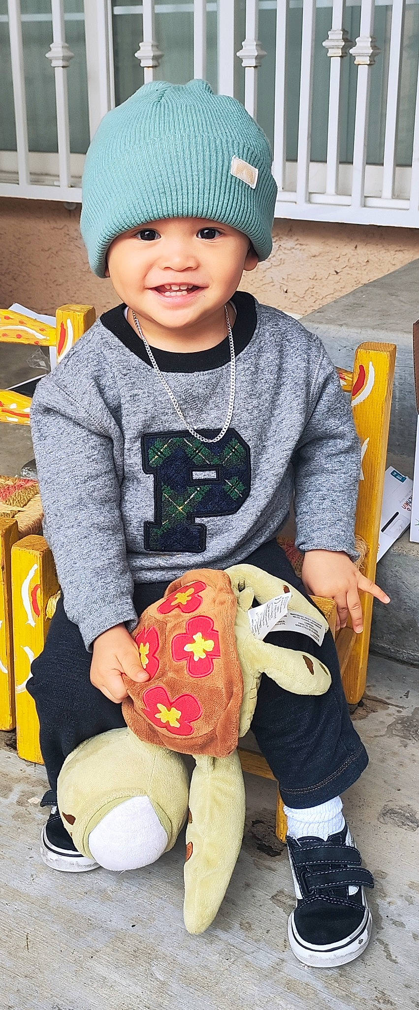 Paulix is registered to the contest to win money with this photo: baby, baby_toddler_clothing, cap, child, clothing, face, facial_expression, fun, happy, headgear, headwear, organ, people, person, photograph, skin, sleeve, smile, snapshot, t_shirt