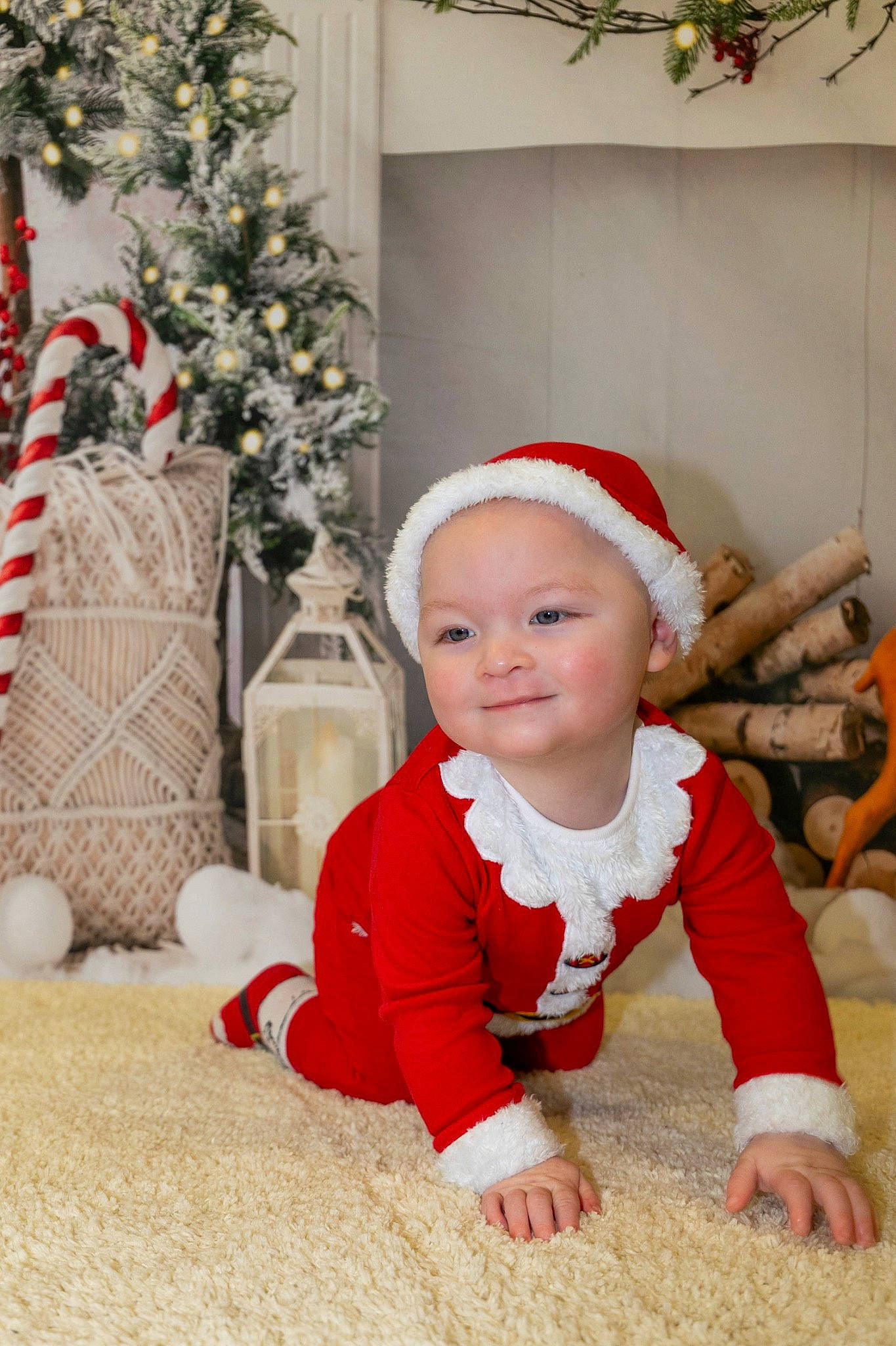 Rhys joined the competition — help win amazing prizes! baby, baby_toddler_clothing, carmine, child, christmas, christmas_decoration, christmas_eve, christmas_ornament, event, flooring, happy, holiday, joy, person, red, sitting, sleeve, smile, toddler, white