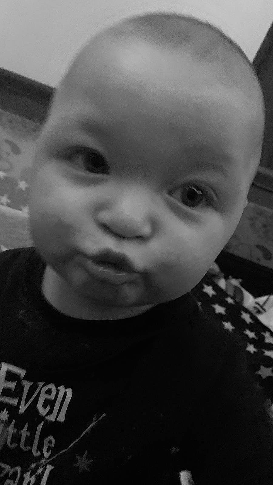 Rhys is registered to the contest to win money with this photo: black_and_white, cheek, chin, ear, eye, eyebrow, eyelash, facial_expression, forehead, hairstyle, happy, human, iris, lip, mouth, nose, person, skin, smile, standing