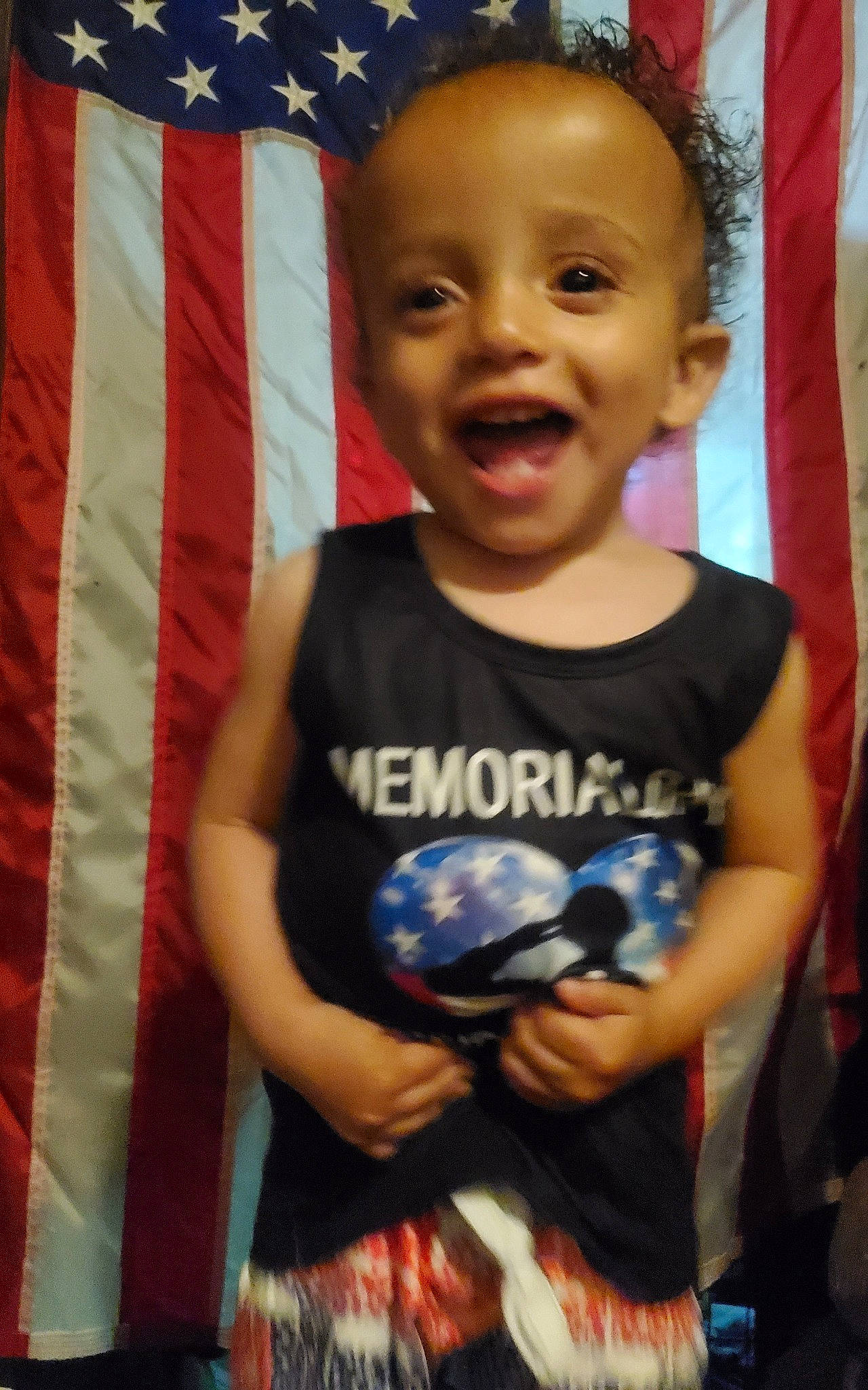 Xzavyor is registered to the contest to win money with this photo: baby, baby_laughing, baby_toddler_clothing, cheek, child, electric_blue, event, flag, flag_day_usa, flag_of_the_united_states, fun, happy, head, pattern, person, play, sitting, sleeve, smile, t_shirt