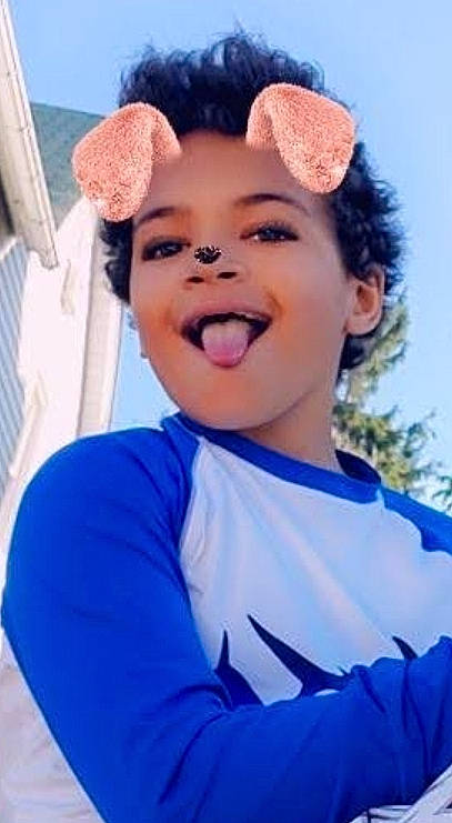 Tyson is registered to the contest to win money with this photo: chin, electric_blue, eyebrow, facial_expression, forehead, gesture, hairstyle, happy, jheri_curl, laugh, lip, person, pleased, ringlet, style, tooth