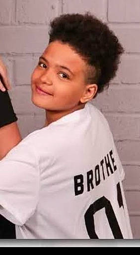 Tyson joined the competition — help win amazing prizes! black, black_hair, chin, cool, eyebrow, facial_expression, forehead, hairstyle, jersey, jheri_curl, joint, joy, neck, person, shoulder, sleeve, sports_jersey, sportswear, style, top