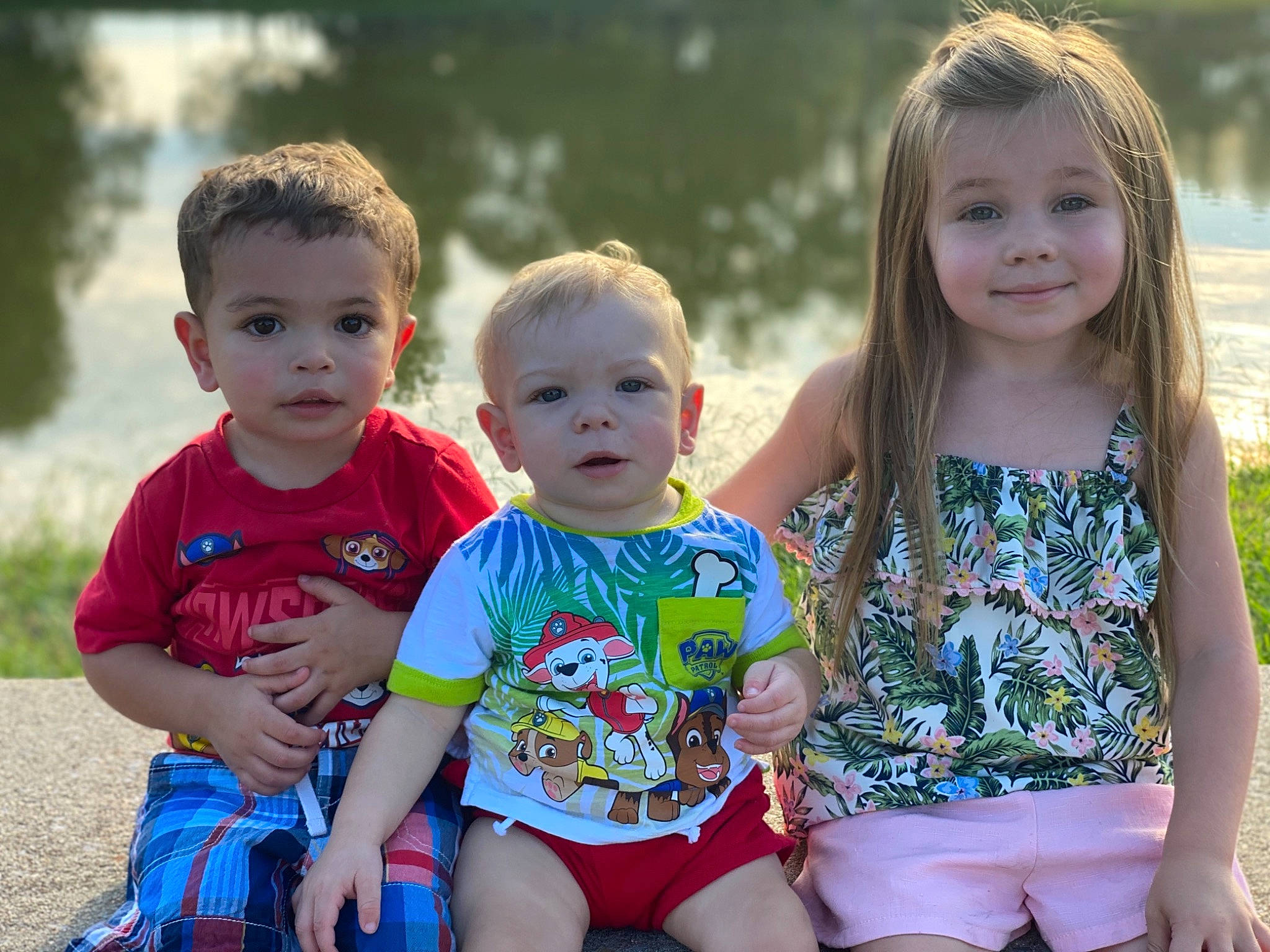 Madilyn is registered to the contest to win money with this photo: child, cousin, family, fun, happy, joy, people, person, photography, play, shorts, sibling, sitting, smile, summer, t_shirt, toddler, vacation